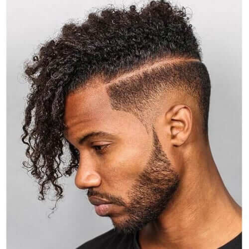 26. Afro-textured Side-swept Undercut with Short beard