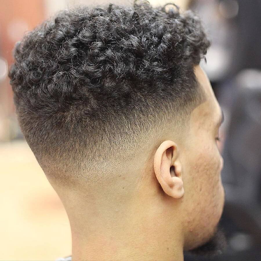 Medium Length Curls + Mid Skin Fade