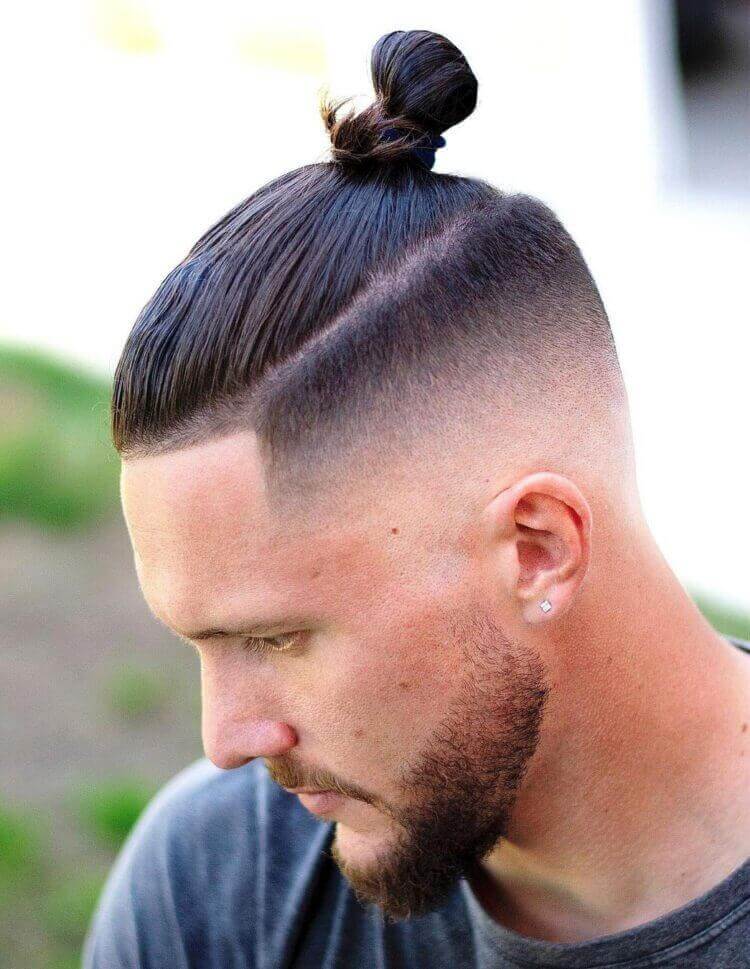 Slick Man Bun with Undercut Taper Fade