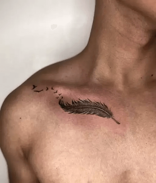 Feather Tattoo On Collarbone-11